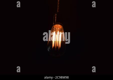 loft incandescent lamp with Black background Stock Photo