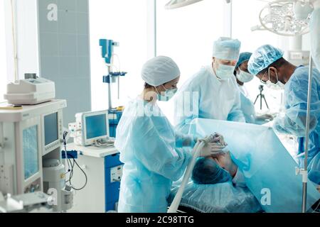 attempt to fix a problem. surgons improving a person's mental, physical condition Stock Photo