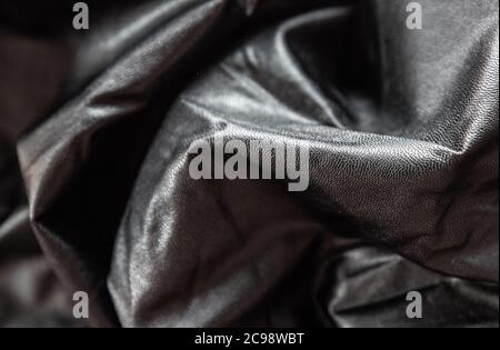 texture of crumpled black leather, black and white, background, close up Stock Photo