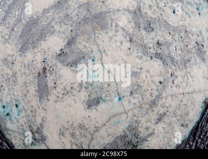A crack pattern in the glaze of a ceramic plate., close up Stock Photo
