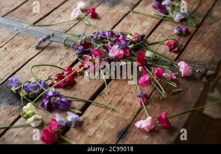 Flowers arranged on a table at Wedding lunch. Stock Photo