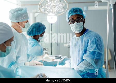 african surprised scared man with tired expression looking at the camera. close up photo. Stock Photo