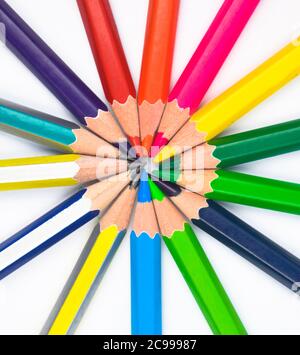 Round circle made with many different colored wood pencil crayons on a white paper Stock Photo