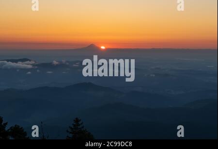 Sunrise over the southern flank of Mount Hood, with the Willamette Valley in the foreground. Stock Photo