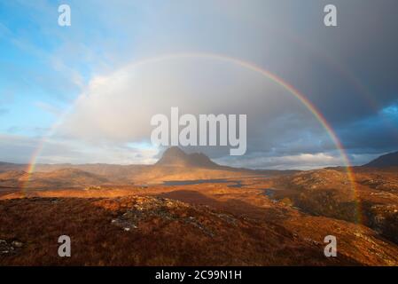 Dramatic rainbow over Suilven mountain, Sutherland Stock Photo