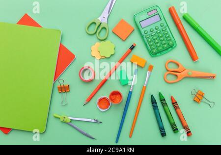 School supplies on red background. Education, Back to School, kids  creativity concept Stock Photo by rawf8