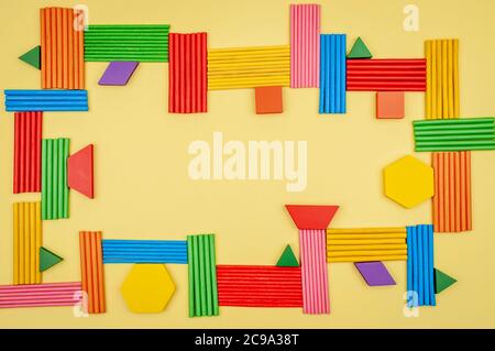 Abstraction with geometric shapes on a yellow background. Stock Photo