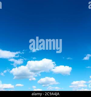 Dark blue sky with white clouds, may be used as background Stock Photo
