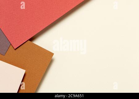 Abstract geometric paper background in earth tone. Many earth tones originate from clay earth pigments, such as umber, ochre, and sienna. Stock Photo