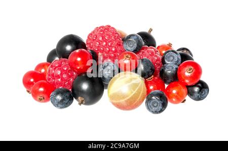 Fresh berries isolated on white background. Mixed, assorted berries including currant, blueberry, raspberries and gooseberries. Stock Photo