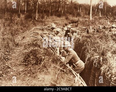 1910s 1917 369th INFANTRY AFRICAN-AMERICAN REGIMENT HARLEM HELLFIGHTERS 15TH NEW YORK SOLDIERS IN TRENCHES DURING WORLD WAR 1 - kh13348 NAW001 HARS WORLD WARS WORLD WAR OCCUPATIONS COLONEL HEROES NEW YORK WARFARE FORMERLY US ARMY COOPERATION FIREARM FIREARMS INFANTRY MID-ADULT MID-ADULT MAN NICKNAME TRENCHES WORLD WAR ONE WW1 WWI YOUNG ADULT MAN 1917 BLACK AND WHITE HARLEM NATIONAL GUARD OLD FASHIONED REGIMENT WILLIAM WORLD WAR I AFRICAN AMERICANS Stock Photo