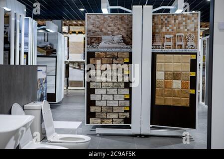 Ukraine, Kyiv- December 19, 2019: Colorful samples of a stone tile in store. Marble and granite flooring a most popular choice for modern kitchens and Stock Photo