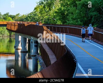 People walking along the312 RiverRun and Riverview Bridge, Chicago, Illinois. Stock Photo