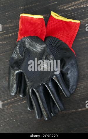 black rubberized gloves Stock Photo