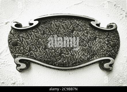 empty metal memorial plaque on wall Stock Photo