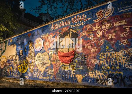 PRAGUE, CZECH REPUBLIC, APRIL 2020 - The John Lennon Wall. Famous place in Prague - Wall is filled with John Lennon inspired graffiti and lyrics from Stock Photo