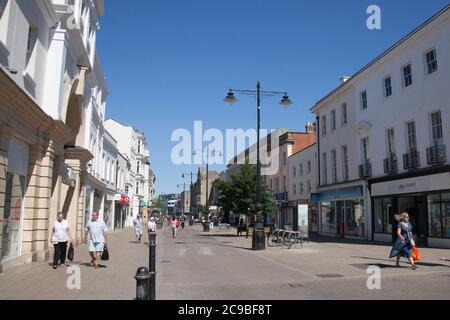 The High Street of Cheltenham in Gloucestershire in the UK Stock Photo