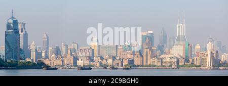 Large panorama of The Bund. High resolution skyline of Shanghai Puxi. With ships on Huangpu River. Stock Photo
