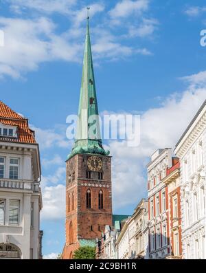 Lübeck, Schleswig-Holstein / Germany - June 22, 2020: Steeple of Jakobikirche. In 1334 consecrated as church of the sailors and fishermen. Portrait fo Stock Photo