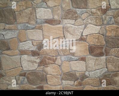 robust coating for walls and floors with stones of different sizes and colors Stock Photo