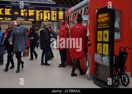 LNER Railway staff helping passengers at York Railway Station Stock ...