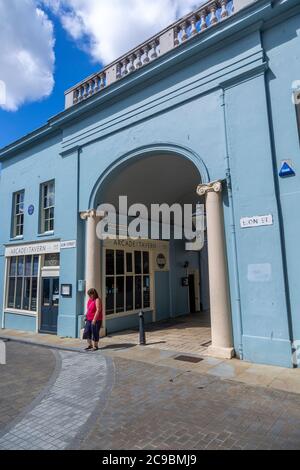 Archway entrance to Arcade Street showing the Arcade tavern pub, Ipswich, Suffolk, England, UK Stock Photo