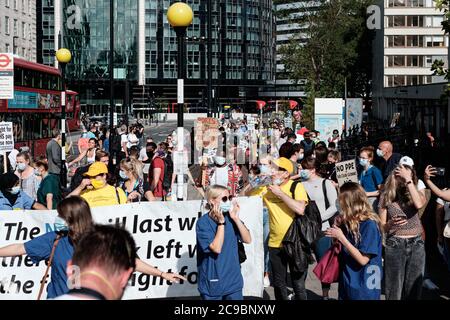 NHS workers descended to Downing Street to demand an immediate pay rise Stock Photo