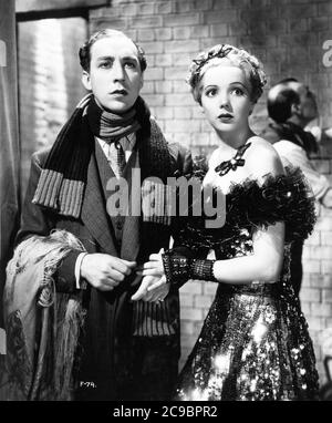 SONNIE HALE and JESSIE MATTHEWS in FIRST A GIRL 1935 director VICTOR SAVILLE Gaumont British Picture Corporation Stock Photo