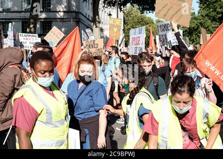 NHS workers descended to Downing Street to demand an immediate pay rise Stock Photo