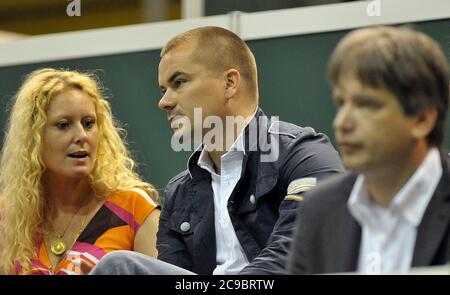 ***FILE PHOTO*** L-R Gabriela Kloudova, secretary of Prime Minister Mirek Topolanek, lobbyist Marek Dalik and Brno Mayor Roman Onderka watch semifinals of the Fed Cup, World Group I, between the Czech Republic and the USA, on April 26, 2009, in Brno, Czech Republic. *** Czech Deputy PM and Interior Minister Jan Hamacek, leader of the junior government Social Democrats (CSSD), will marry former Prague politician for the right-wing Civic Democrats (ODS) Gabriela Kloudova this week, which will be his second marriage, the SeznamZpravy.cz server writes on July 30, 2020. (CTK Photo/Igor Zehl)