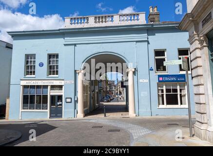 Archway entrance to Arcade Street showing the Arcade tavern pub, Ipswich, Suffolk, England, UK Stock Photo