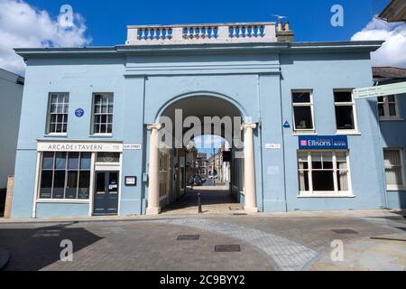 Archway entrance to Arcade Street showing the Arcade tavern pub, Ipswich, Suffolk, England, UK Stock Photo
