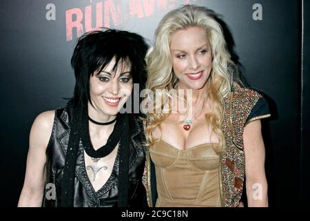 Los Angeles, USA. 11th Mar, 2010. Joan Jett and Cherie Currie of The Runaways at the premiere of the movie 'The Runaways' at the ArcLight Cinemas Cinerama Dome. Los Angeles, March 11, 2010 | usage worldwide Credit: dpa/Alamy Live News Stock Photo