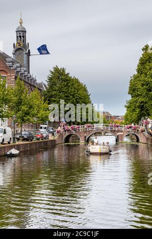 Leiden, Netherlands - July 22, 2020: Cityscape Leiden view Rapenburg with Academy building of the Univerity of Leiden. Stock Photo
