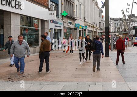 Cork, Ireland. 30th July, 2020. City Bustling After Yesterday's Heavy Rain, Cork City. The city centre was bustling again this morning after the heavy rain that saw a noticeable impact on the numbers in city yesterday. Credit: Damian Coleman/Alamy Live News Stock Photo