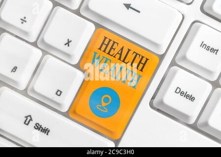Conceptual hand writing showing Health Wealth. Concept meaning healthy mind and body can bring you wealth and happiness Colored keyboard key with acce Stock Photo