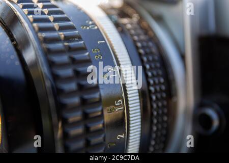 Old manual lens, focusing ring of vintage lens Stock Photo