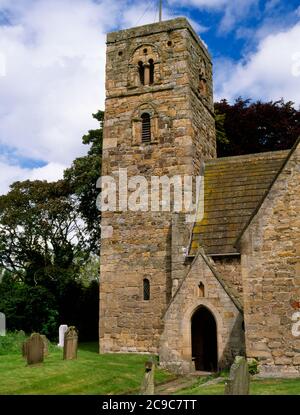 View NE of the pre-Conquest tower at the W end of St Andrew's Church, Bywell, Northumberland, England, UK: 'the best Saxon tower in the county'. Stock Photo