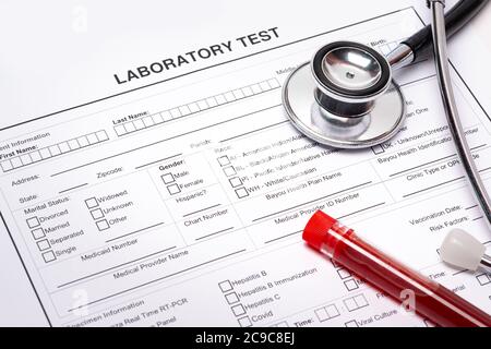 Laboratory form to fill of blood test, mask, gloves, stetoscope and a ...