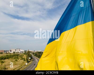 National flag of Ukraine. Kyiv aerial Stock Photo