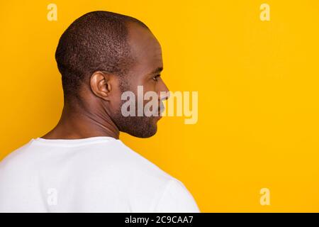 Close-up rear back behind view portrait of his he nice attractive content serious guy neat grooming service skin care isolated over bright vivid shine Stock Photo