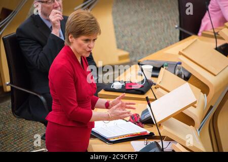 Edinburgh, Scotland, UK. 30th July, 2020. Pictured: Nicola Sturgeon MSP - First Minister of Scotland and Leader of the Scottish National Party (SNP) giving a ministerial statement: COVID 19 Next Steps. Credit: Colin Fisher/Alamy Live News Stock Photo