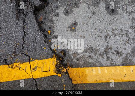 cracked asphalt background and texture Stock Photo