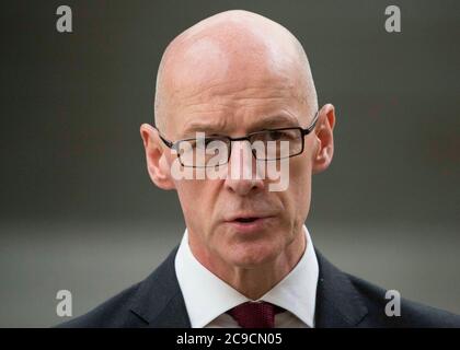 Deputy First Minister and Cabinet Secretary for Education John Swinney speaks to members of the media after the Scottish government announced changes to the Covid-19 lockdown, including the opening of schools. Stock Photo