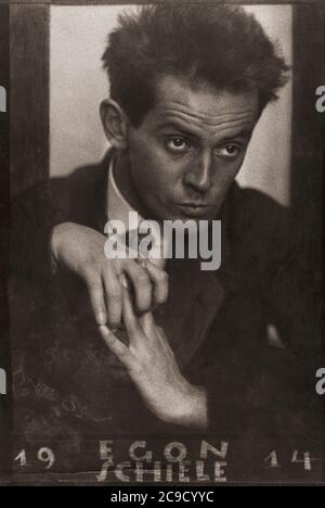 Egon Schiele, 1890 - 1918.  Austrian painter.  After a 1914 portrait by Austrian born Czech photographer Anton Josef Trčka.  Trčka signed his work “Antios”.  In this photograph the pseudonym is crudely scratched on the lower left of the picture. Stock Photo
