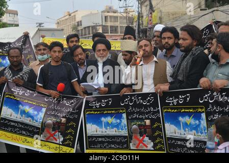 Lahore, Pakistan. 29th July, 2020. Pakistani activists of Tehreek-e-Tausee Darbar Hazrat Ruqiyya Binte Ali (A.S) are holding protest demonstration for acceptance of their demands outside Press Club in provincial capital city Lahore. Bibi Pak Daman is the mausoleum of Hazrat Ruqiyya Binte Ali (A.S) located in Lahore. Legend has it that it holds the graves of six ladies from Muhammad's household (Ahl Al-Bayt). (Photo by Rana Sajid Hussain/Pacific Press/Sipa USA) Credit: Sipa USA/Alamy Live News Stock Photo