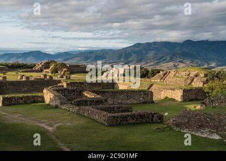 View south from the North Platform with the Sunken Plaza with Building B at right and the buildings of Group IV, and Group M in the background.  Zapot Stock Photo