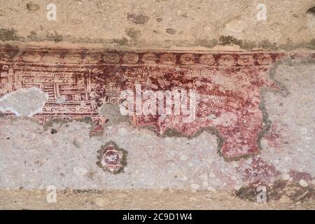 Detail of the painted frescoes in Courtyard A (Quadrangle A) the ruins of the Zapotec city of Mitla, Oaxaca, Mexico.  A UNESCO World Heritage site. Stock Photo