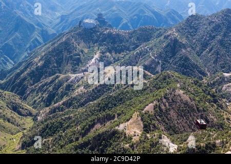 Divisadero, Copper Canyon, Chihuahua, Mexico. Aerial Gondola En Route to Docking Station (highlighted upper middle). Stock Photo