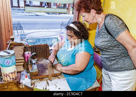 Ybor City Tampa Florida,7th Avenue,historic Latin Quarter,Nicahabana Cigars,Hispanic Latin Latino ethnic immigrant immigrants minority,adult adults wo Stock Photo
